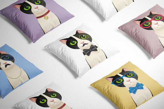 Alfred Cat White Cushion on a white background surrounded by other cat design cushions