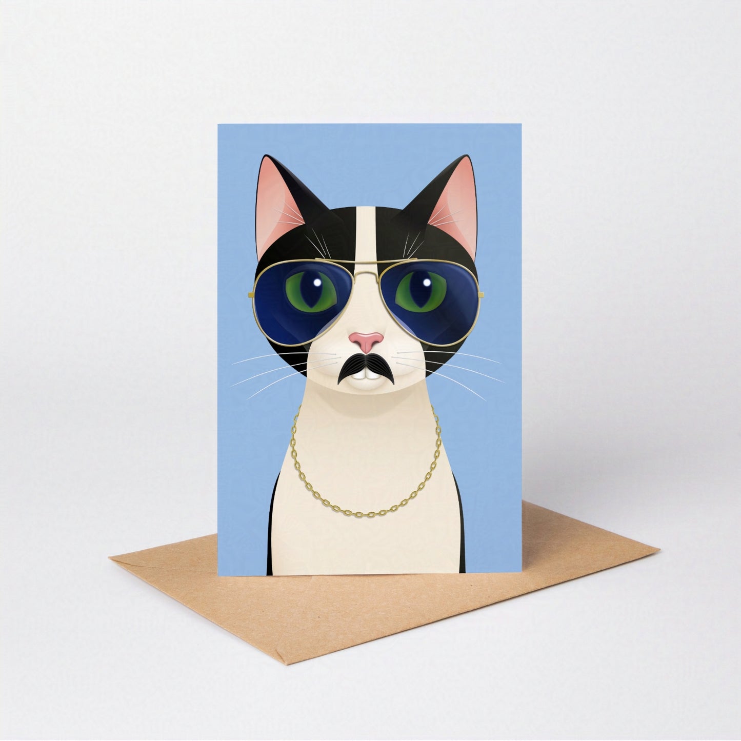 Mrs Cat greeting card standing upright with the tuxedo cat against a blue-coloured card background, on an envelope against a neutral backdrop