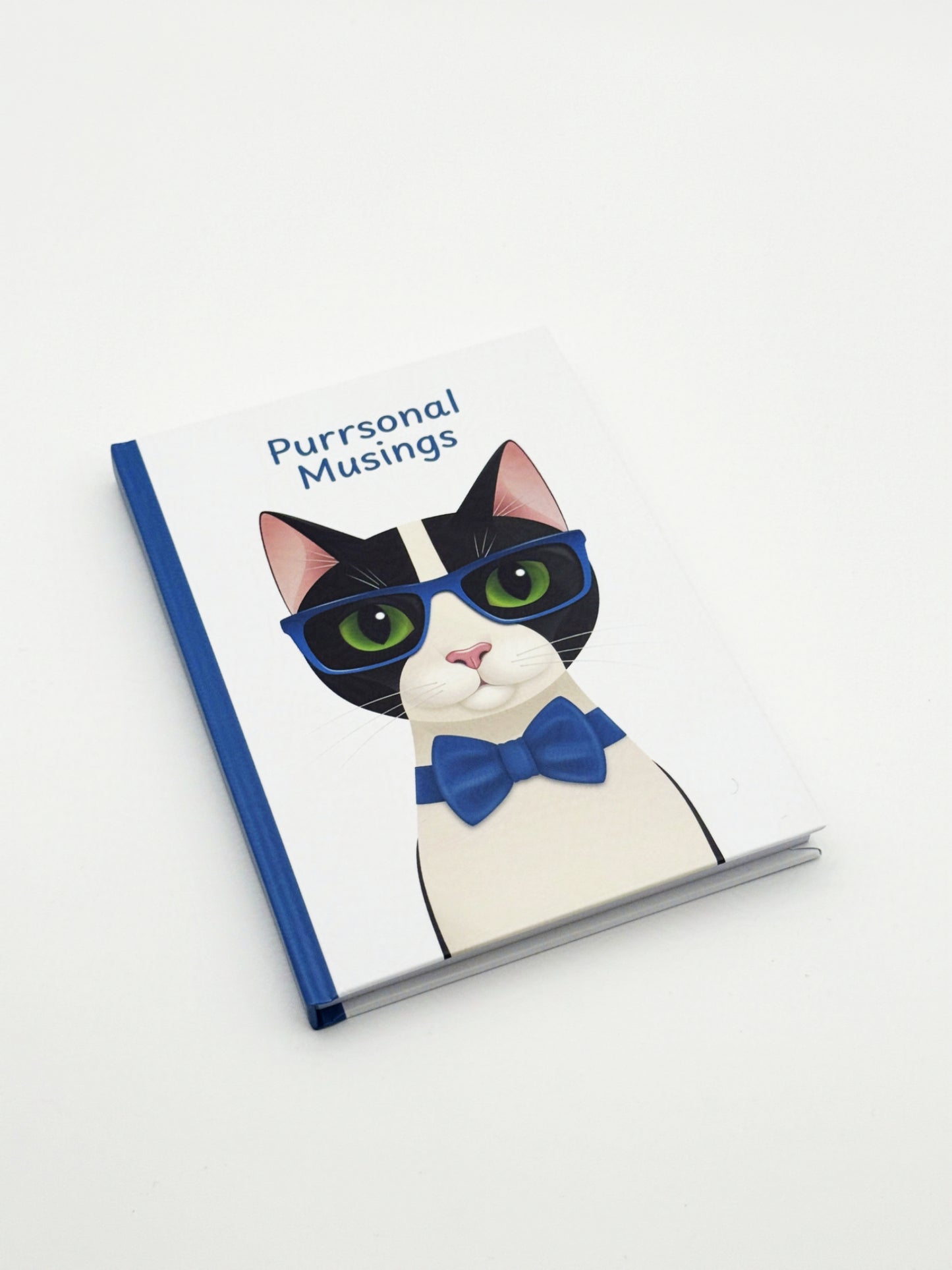 Notebook with a cat illustration and text 'Purrsonal Musings' on a white background