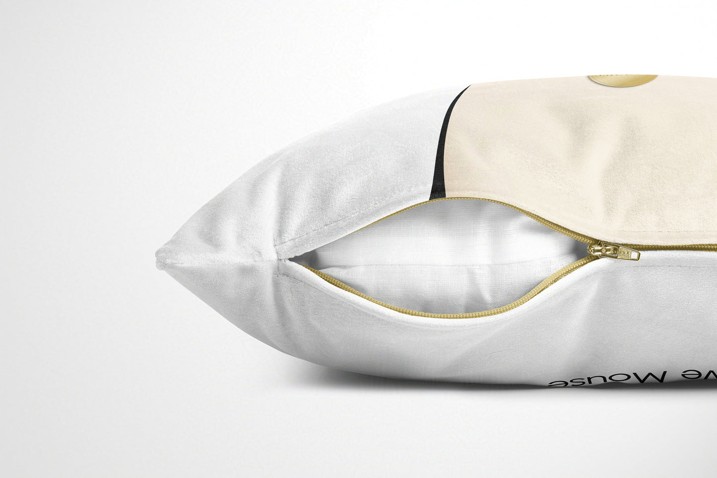 White cushion with gold zipper on a white background