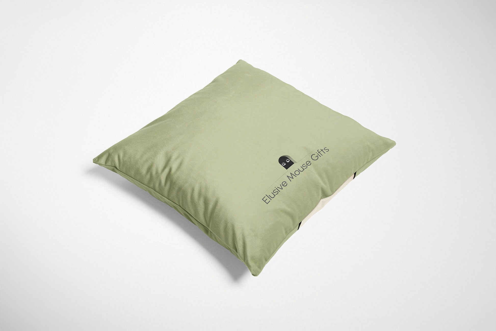 Green cushion with a brand logo on a white background