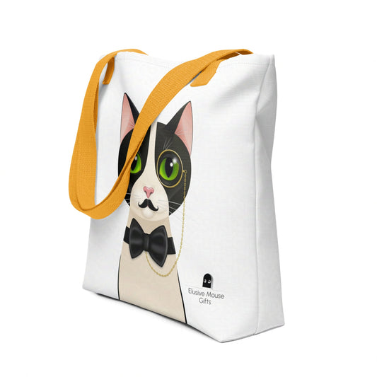 Tote bag featuring Alfred the tuxedo cat in a monocle, fake moustache and black bow tie, shown from a stylish 3/4 angle on a white background