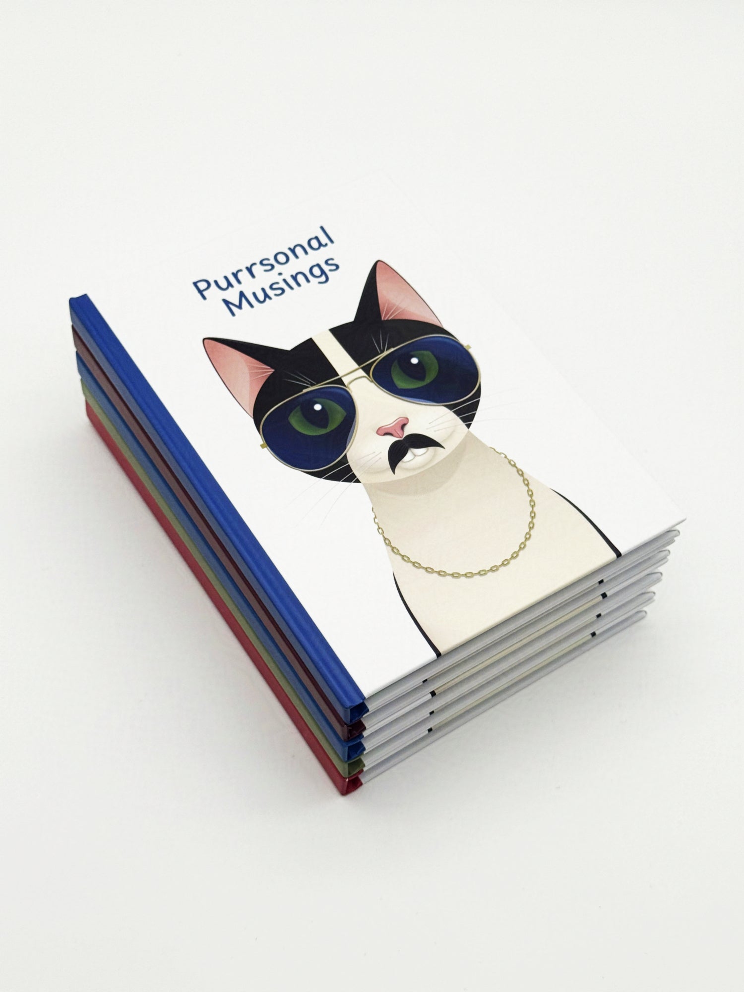 Stack of notebooks with a cat illustration and 'Purrsonal Musings' text on a white background