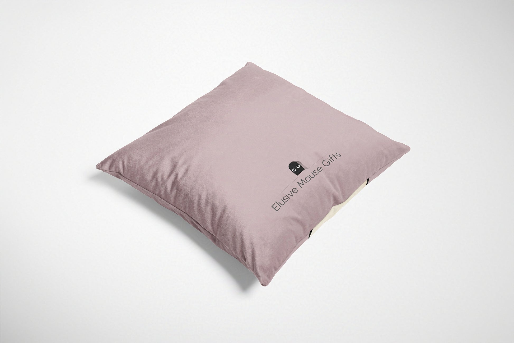 Pink cushion back with 'Elusive Mouse Gifts' branding on a white background