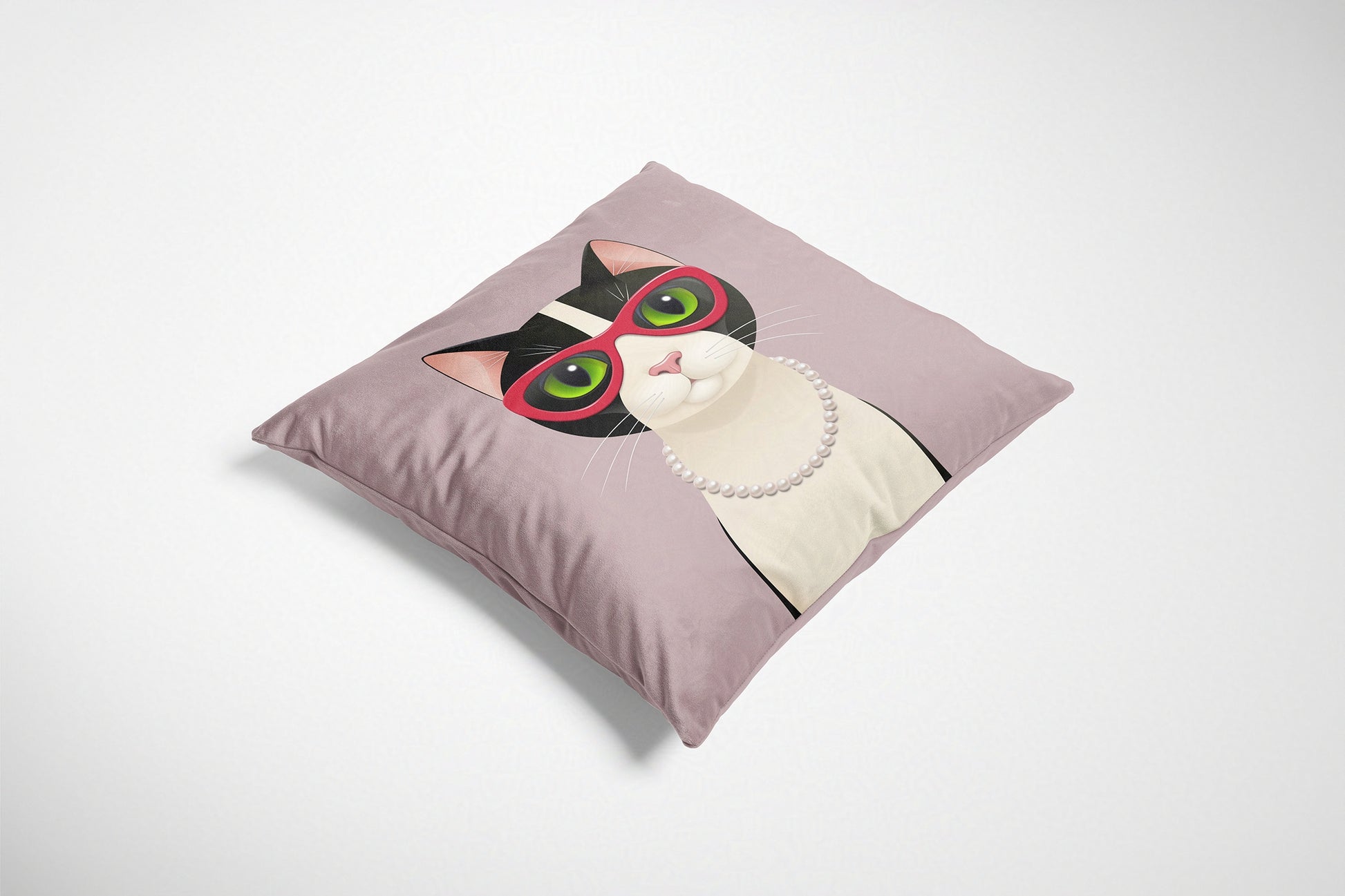 Decorative cushion with a cat design wearing glasses on a white background