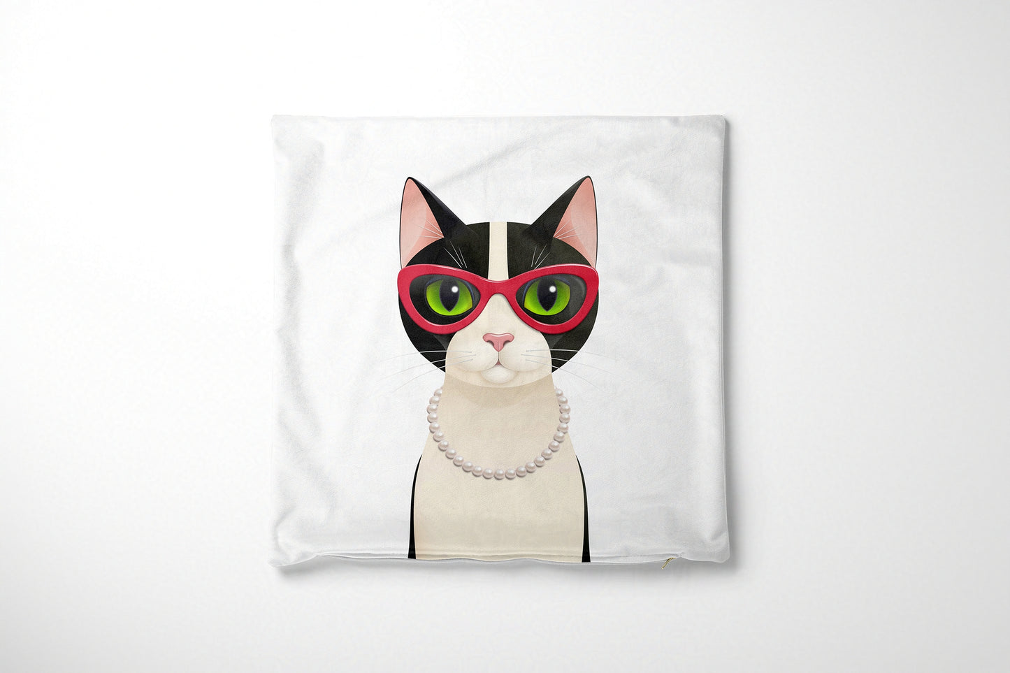 Cushion cover with a cat design wearing red glasses and a pearl necklace on a white background