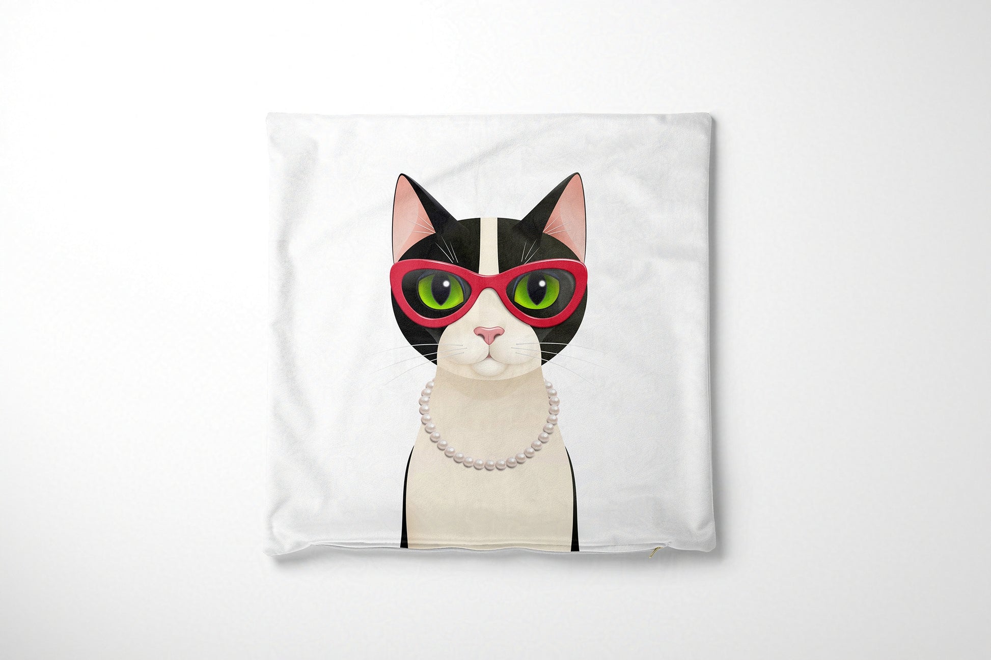 Cushion cover with a cat design wearing red glasses and a pearl necklace on a white background