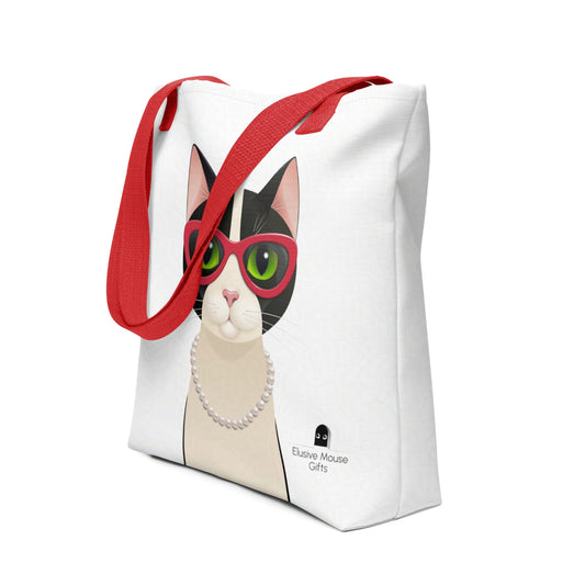 Tote bag featuring Mrs Cat in cat eye glasses and a pearl necklace, shown at a 3/4 angle against a white background