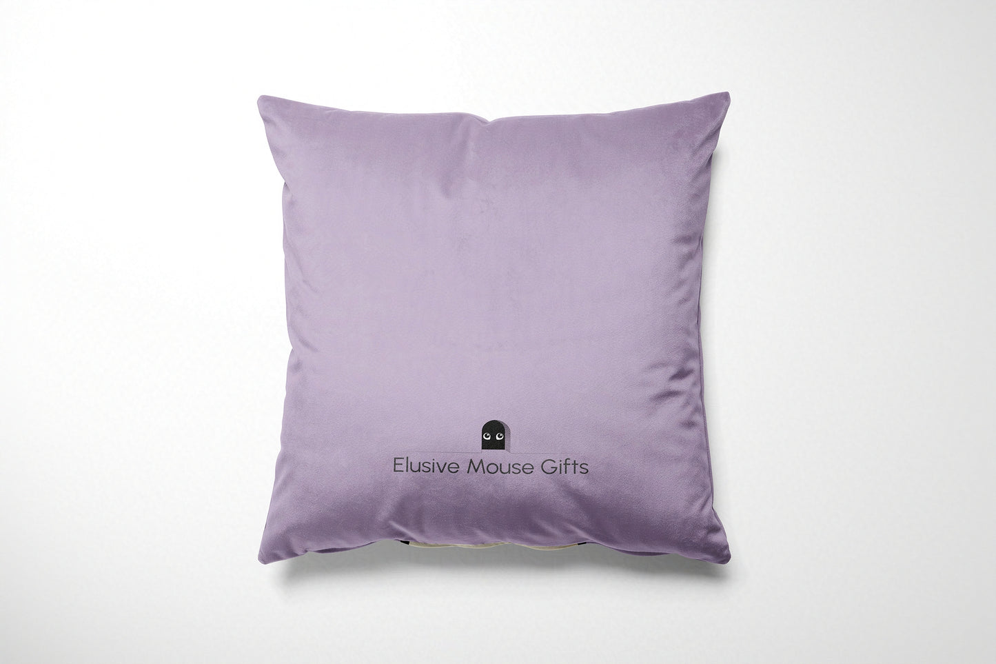 Lavender pillow with 'Elusive Mouse Gifts' logo on a white background