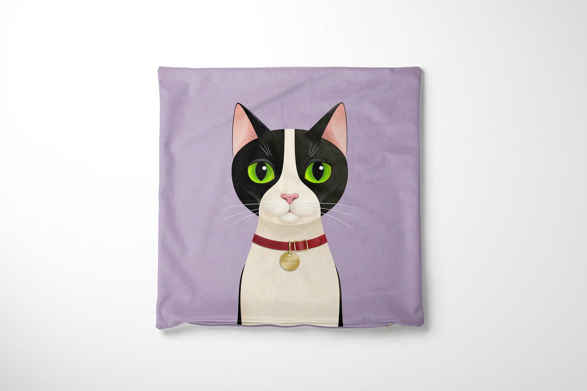 Purple cushion cover with a cartoon cat design on a white background