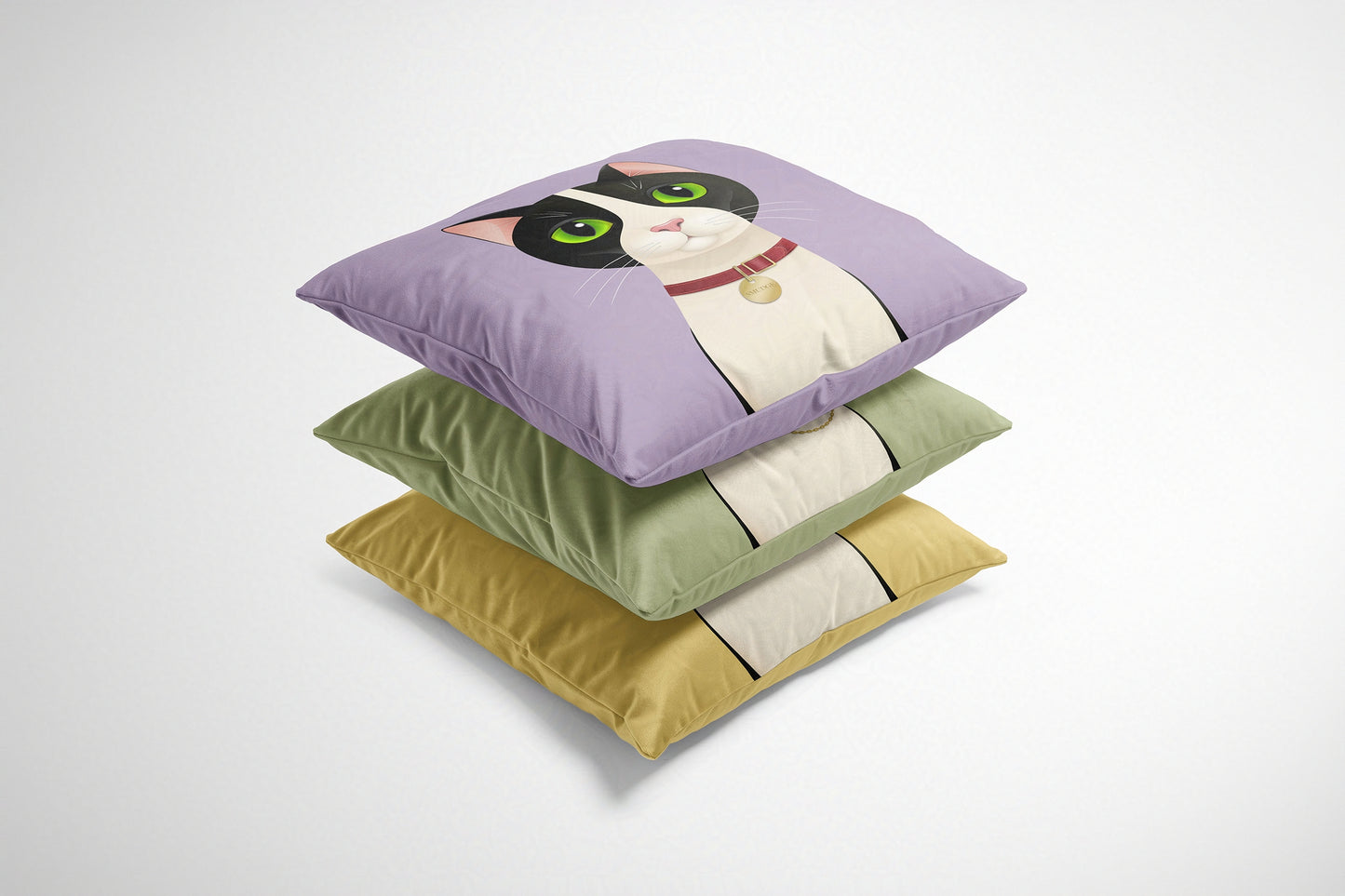 Stack of three cat-themed cushions in purple, green, and yellow on a white background
