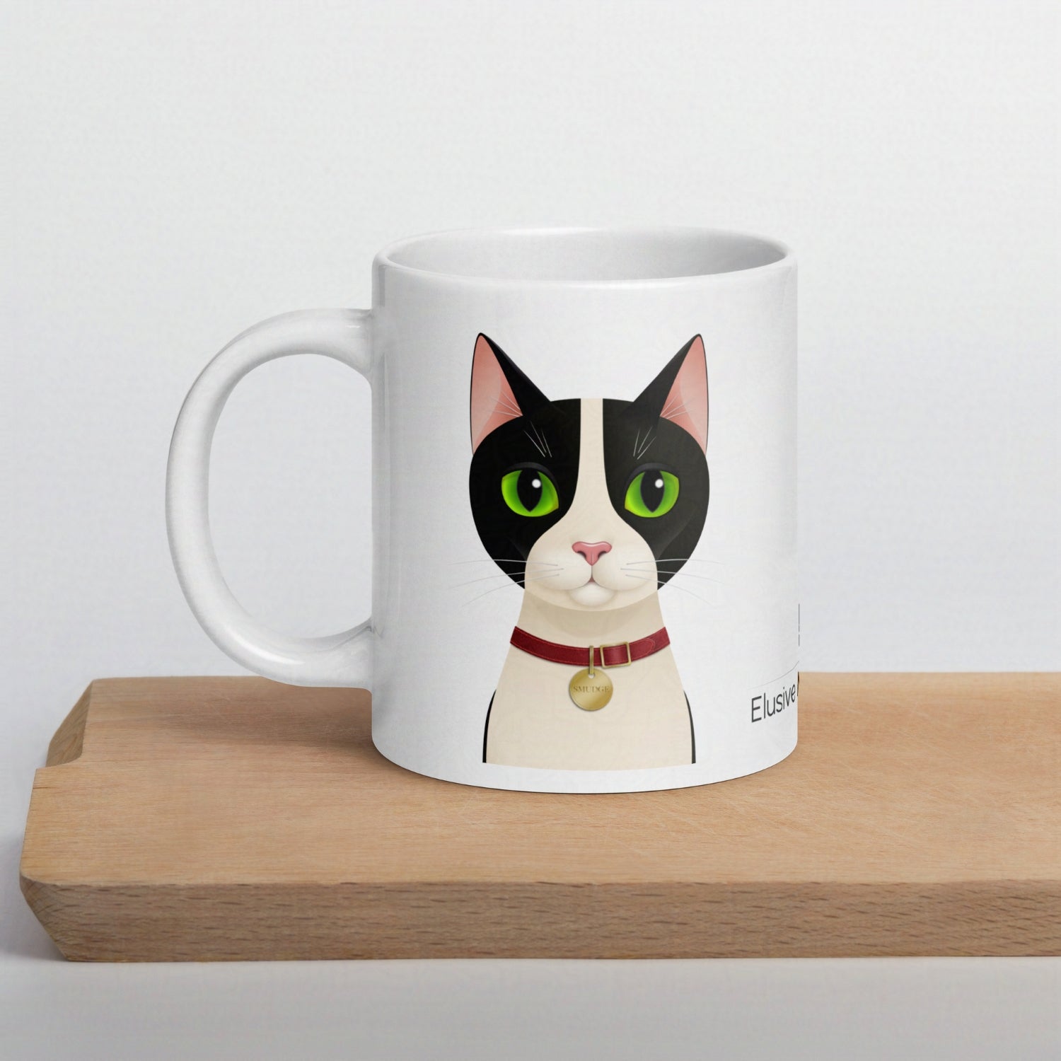 Smudge 20oz mug resting on a wooden chopping board against a plain background, highlighting the design and shape