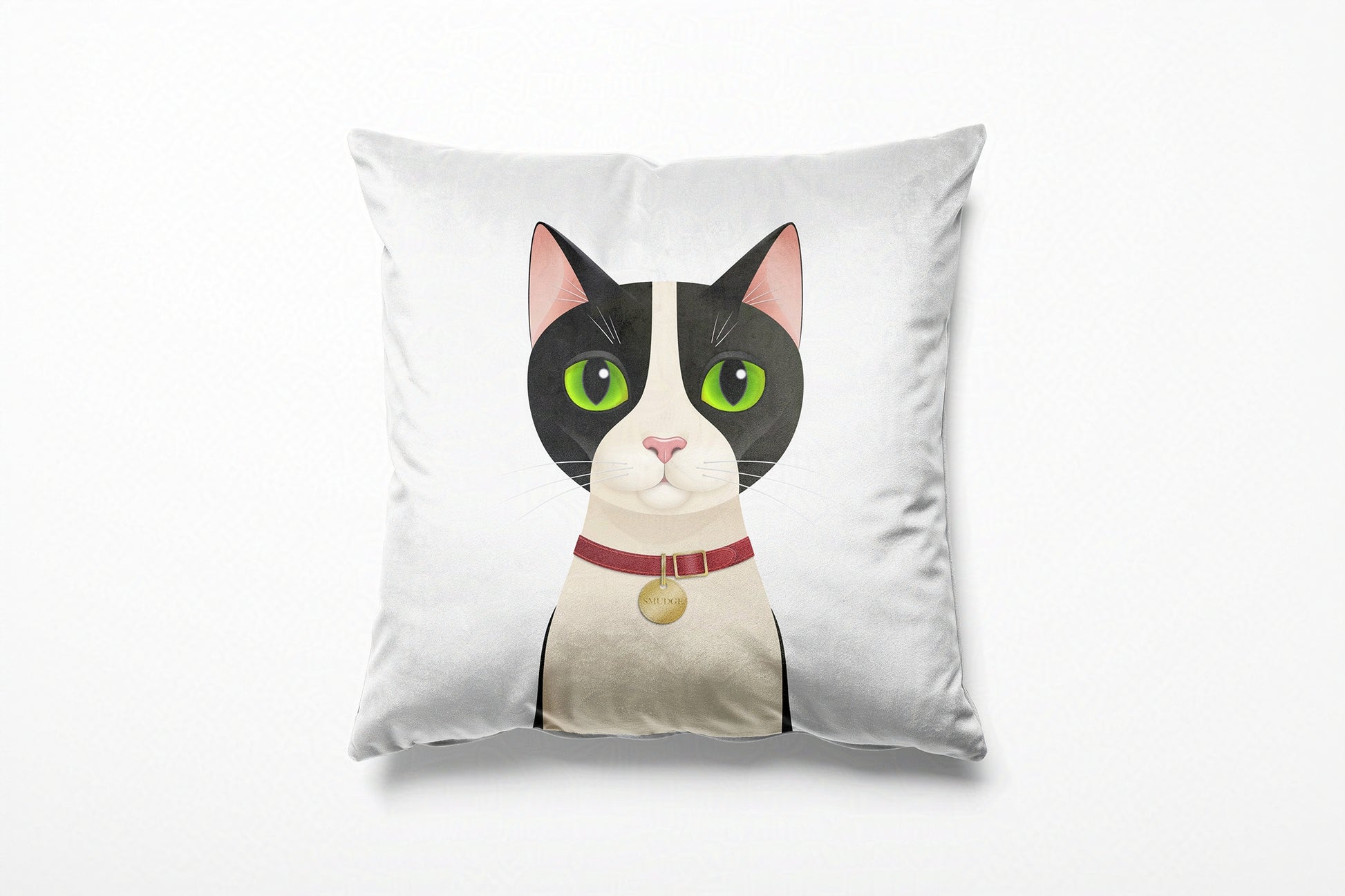 White cushion with a cat illustration on a white background